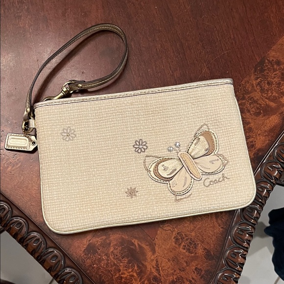 Coach Handbags - Coach Cream Gold Wristlet with Butterfly Embroidery Large Purple interior